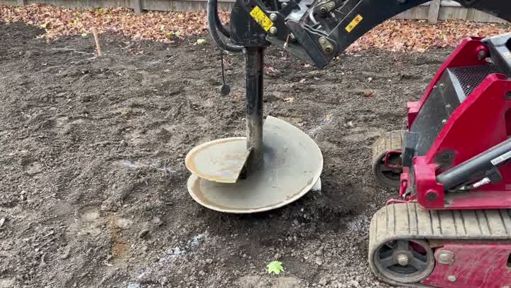 Well drilling auger boring into the ground